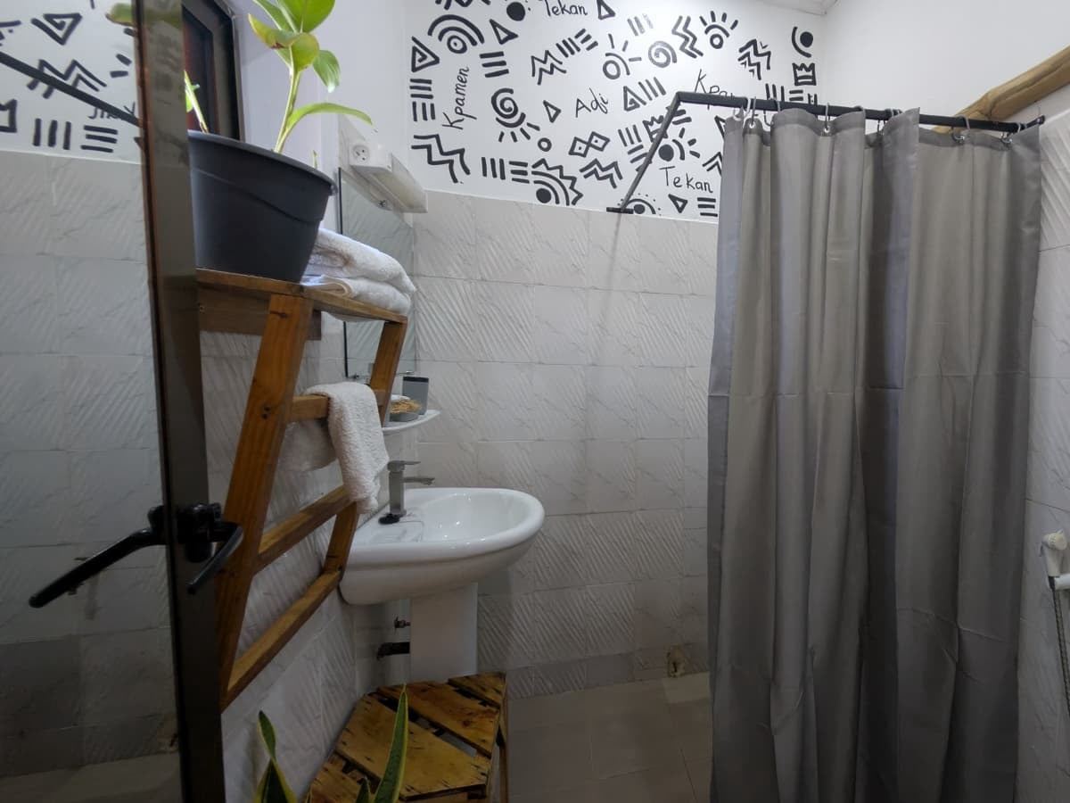 Habitación Sè (cama doble) - casa de huéspedes Canelya, Fidjrossè, Cotonú