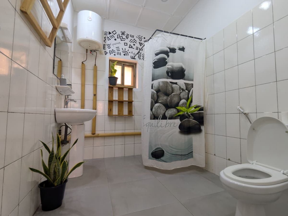 Chambre Ko (lit king size) - maison d'hôtes Canelya, Fidjrossè, Cotonou