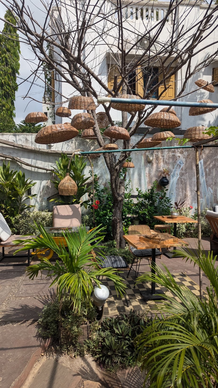 Jardim e quartos da La Maison de Canelya em Fidjrossè – foto 7
